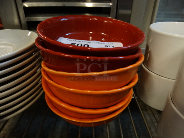 6 Ceramic Bowls; 2 Red and 4 Orange. 5.5x5.5x1.5. 6 Times Your Bid!