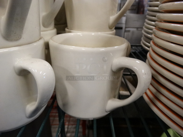 15 White Ceramic Mugs. 5x3.5x3.5. 15 Times Your Bid!