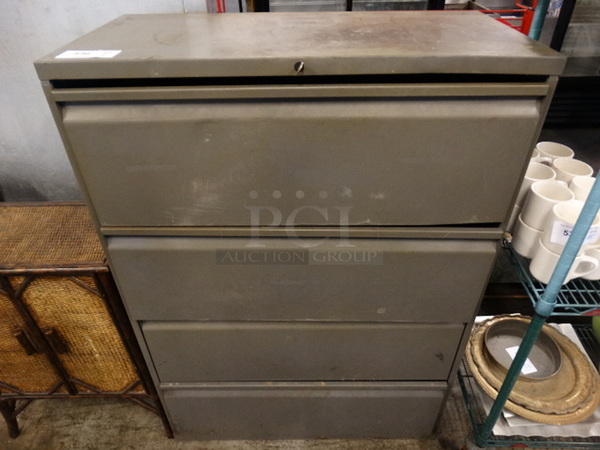 Gray Metal 4 Drawer Filing Cabinet. 36x18x52
