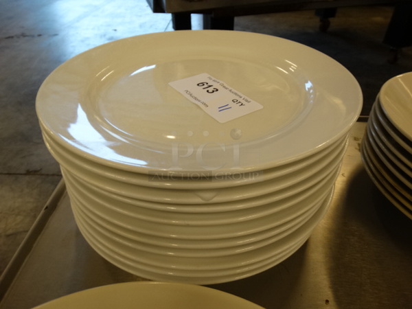 11 White Ceramic Plates. 12x12x1. 11 Times Your Bid!