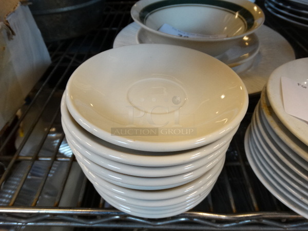 11 White Ceramic Saucers. 5x5x1. 11 Times Your Bid!