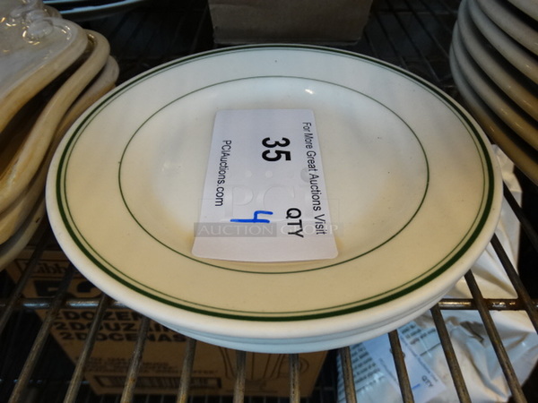 4 White Ceramic Plates w/ Green Lines on Rim. 7x7x1. 4 Times Your Bid!
