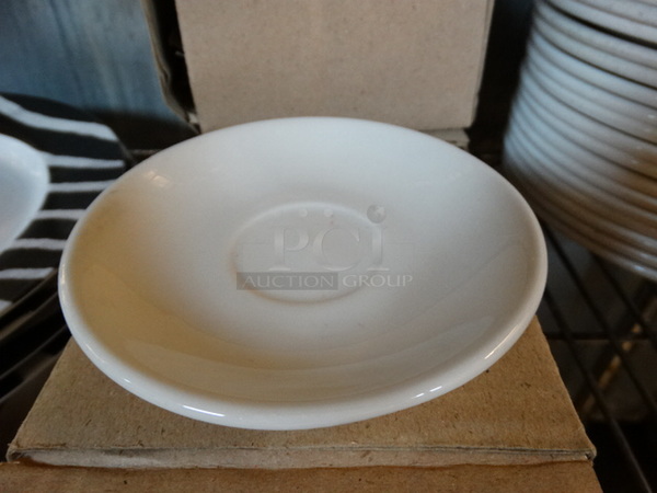 18 BRAND NEW IN BOX! White Ceramic Saucers. 5x5x1. 18 Times Your Bid! 