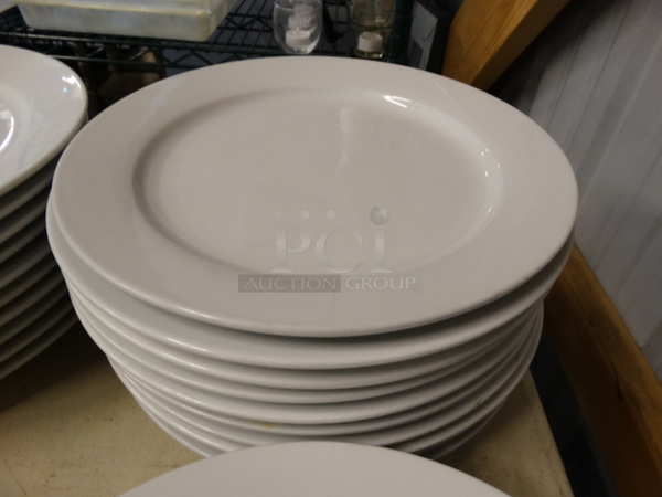 10 White Ceramic Plates. 12x12x1. 10 Times Your Bid!