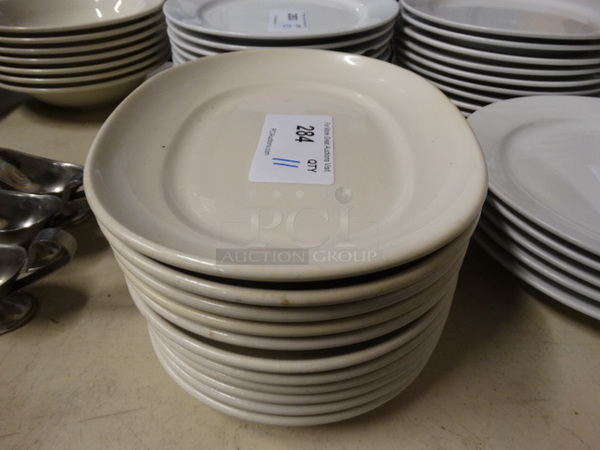 11 White Ceramic Oval Plates. 12x9x1.5. 11 Times Your Bid!