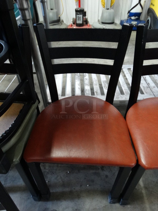 4 Black Metal Dining Chairs w/ Red Seat Cushion. Stock Picture - Cosmetic Condition May Vary. 17x16x33. 4 Times Your Bid!
