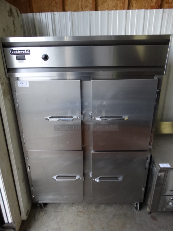 WOW! Continental Model DL2WE-SA-HD Stainless Steel Commercial 4 Half Size Door Reach In Warmer on Commercial Casters. 115/208-230 Volts, 1 Phase. 57x34x83