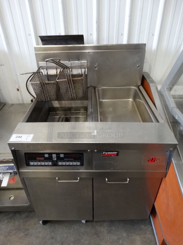 AWESOME! Frymaster Model FM145ECSC Stainless Steel Commercial Natural Gas Powered Single Bay Deep Fat Fryer w/ Right Side Fry Dumping Station and Filtration System on Commercial Casters. 122,000 BTU. 31.5x32x40