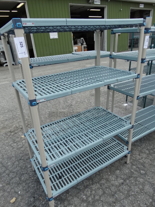 Metro Max Metal and Poly 4 Tier Shelving Unit. 42x24x62. BUYER MUST DISMANTLE. PCI CANNOT  DISMANTLE FOR SHIPPING. PLEASE CONSIDER FREIGHT CHARGES.