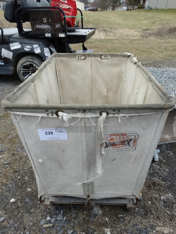 Cloth and Metal Bin on Commercial Casters. 23x35x28