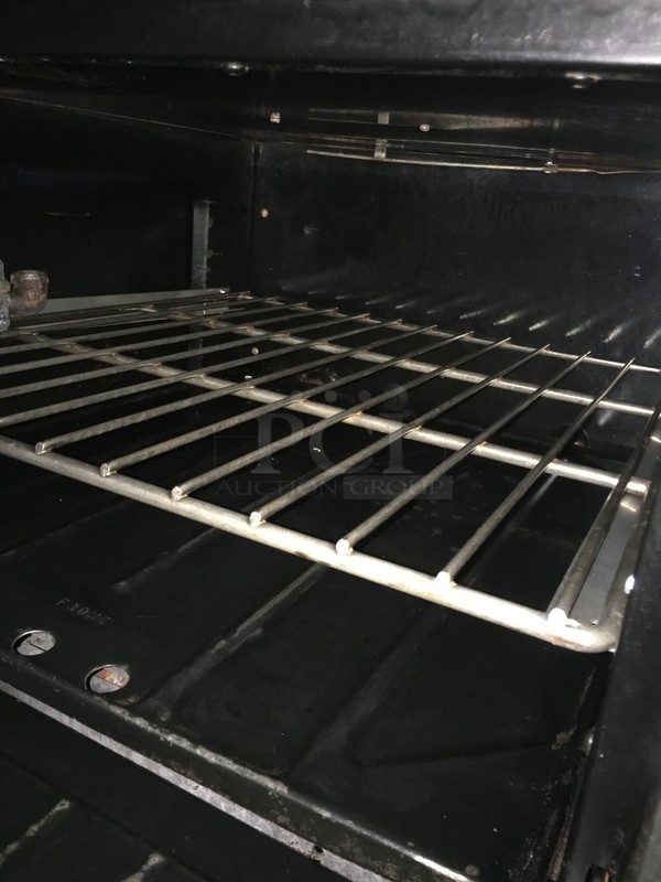 BEAUTIFUL! Garland Commercial Natural Gas Powered Flat Griddle/Plancha! With Raised Backsplash & Salamander Shelf! With Full Size Oven Underneath! All Stainless Steel! Model M47R Serial 0009HG390R! On Legs!  - Image 7 of 10