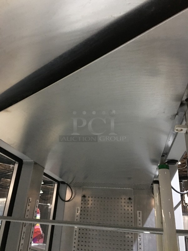FABULOUS! Continental Commercial 3 Door Reach In/Pass Through Refrigerator Merchandiser! With Poly Coated Racks! All Stainless Steel! Model 3RGDPT Serial 14552378! 115/208/230V 1Phase! On Commercial Casters! - Image 7 of 10