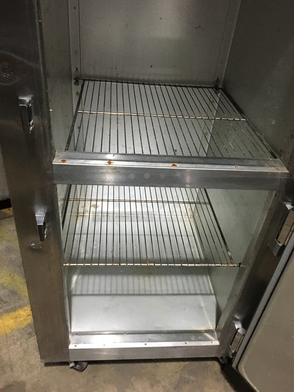 Traulsen Commercial Reach In Refrigerator! With 2 Half Doors! With Racks! All Stainless Steel! Model AHT132WUTHHS Serial T073540A01! 115V 1Phase! On Commercial Casters! - Image 7 of 11