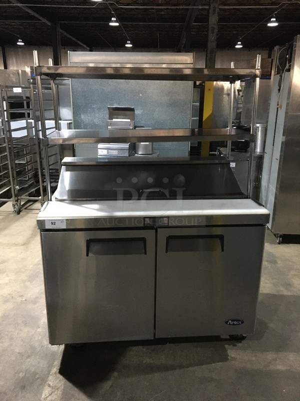 Atosa Commercial Refrigerated Sandwich Prep Table! With 2 Door Underneath Storage Space! With Poly Coated Racks! With Commercial Cutting Board! With Overhead Serving Shelf! All Stainless Steel! Model MSF8302GR Serial MSF8302GRAUS100317042600C40036! 115V 1Phase! On Commercial Casters! - Image 1 of 12