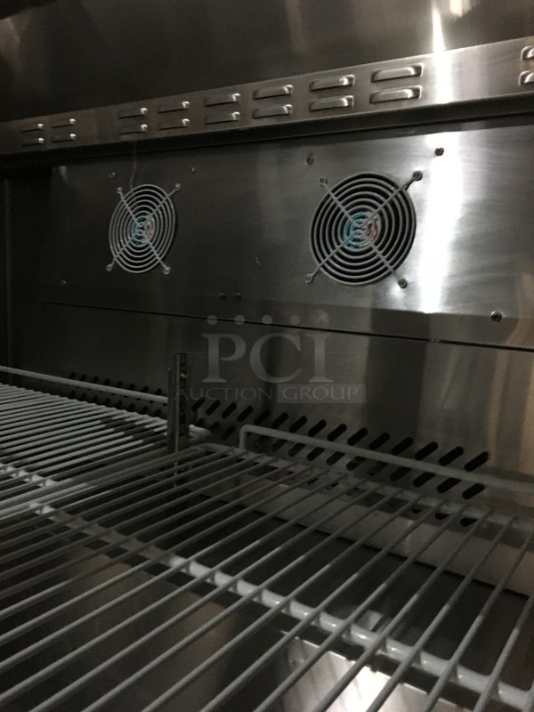 Atosa Commercial Refrigerated Sandwich Prep Table! With 2 Door Underneath Storage Space! With Poly Coated Racks! With Commercial Cutting Board! With Overhead Serving Shelf! All Stainless Steel! Model MSF8302GR Serial MSF8302GRAUS100317042600C40036! 115V 1Phase! On Commercial Casters! - Image 7 of 12