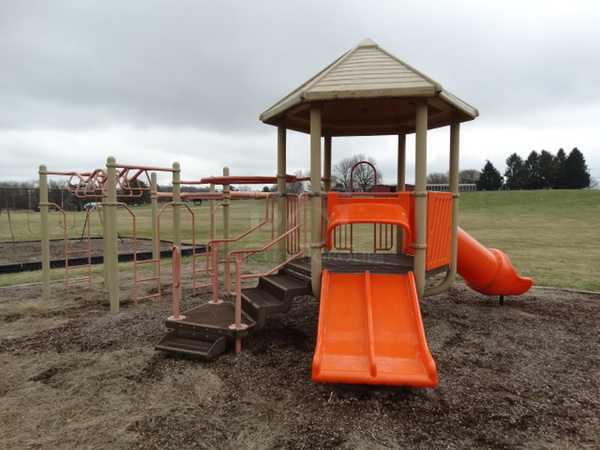 Tan and Orange Metal Playground Unit w/ 2 Slides, Stairs and Monkey Bars. BUYER MUST REMOVE. Item Is Located In Coatesville, PA - Winner Will Have Up To 2 Weeks To Remove. Address Will Be Given To the Winning Bidder After They Provide a Certificate of Insurance