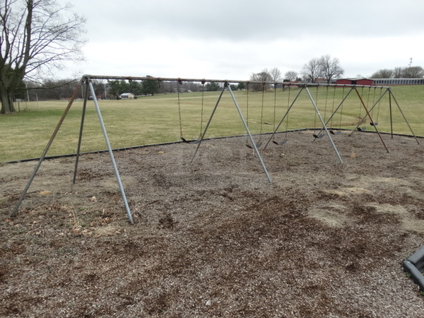 Metal 8 Swing Swingset; Missing 1 Swing Seat. BUYER MUST REMOVE. Item Is Located In Coatesville, PA - Winner Will Have Up To 2 Weeks To Remove. Address Will Be Given To the Winning Bidder After They Provide a Certificate of Insurance - Image 1 of 12
