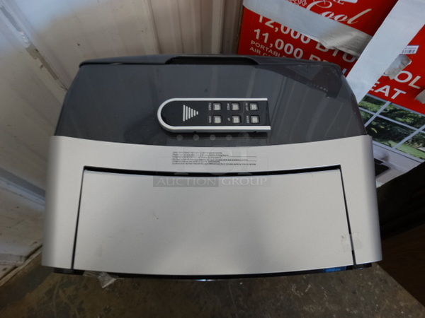 IN ORIGINAL BOX! Portable Air Conditioner/Dehumidifier/Fan/Heater - Image 6 of 9