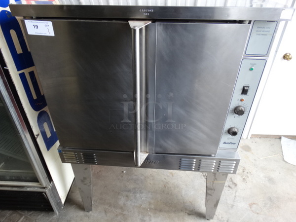 SWEET! Garland SunFire Stainless Steel Commercial Gas Powered Full Size Convection Oven w/ Solid Doors, Metal Racks and Thermostatic Controls on Metal Legs. 38x44x60