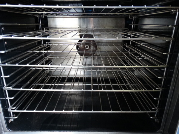 SWEET! Garland SunFire Stainless Steel Commercial Gas Powered Full Size Convection Oven w/ Solid Doors, Metal Racks and Thermostatic Controls on Metal Legs. 38x44x60 - Image 5 of 7