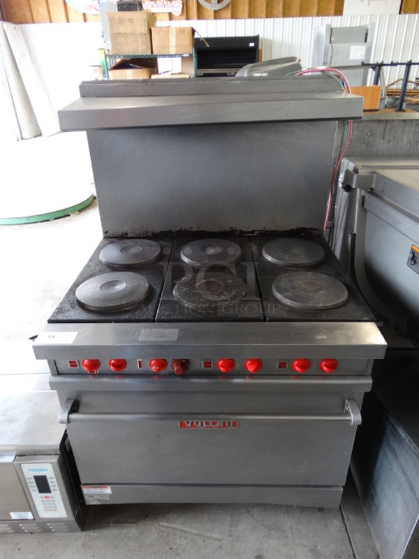 WOW! Vulcan Stainless Steel Commercial Electric Powered 6 Burner Hot Plate Range w/ Oven and Stainless Steel Overshelf on Commercial Casters. 36x30x60