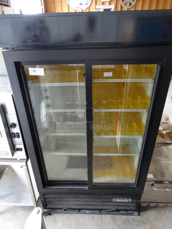 GREAT! Carrier Model MC1100 Metal Commercial 2 Door Reach In Cooler Merchandiser w/ Poly Coated Racks. 120 Volts, 1 Phase. 43x32x78. Tested and Working! - Image 1 of 6