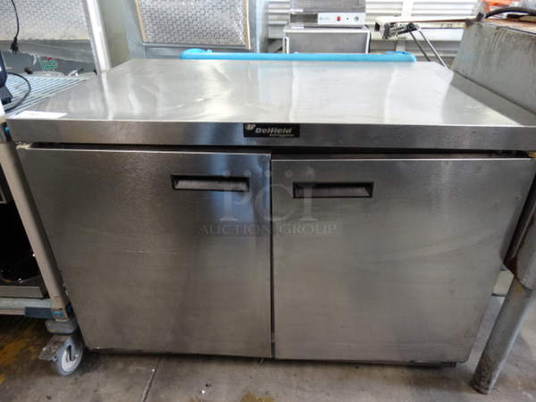 GREAT! 2008 Delfield Model UC4448N Stainless Steel Commercial 2 Door Undercounter Cooler on Commercial Casters. 115 Volts, 1 Phase. 48x32x34.5. Tested and Powers On But Does Not Get Cold