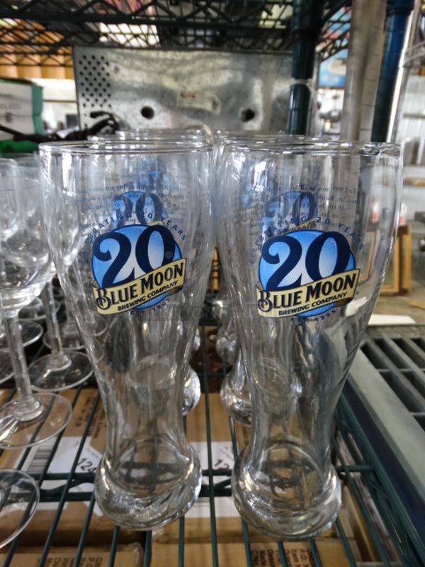 9 Blue Moon Beverage Glasses. 3x3x9. 9 Times Your Bid!