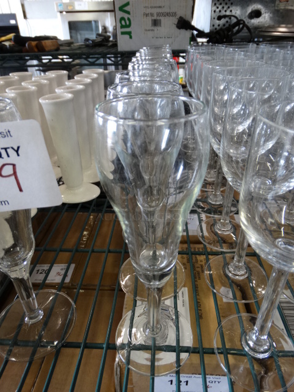 9 Champagne Glasses. 3x3x7.5. 9 Times Your Bid!