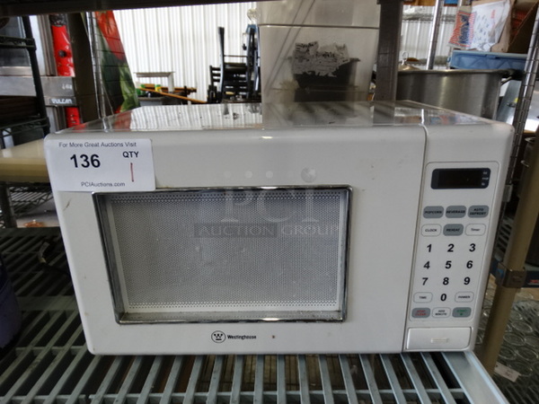 Westinghouse White Countertop Microwave. 18x12x11