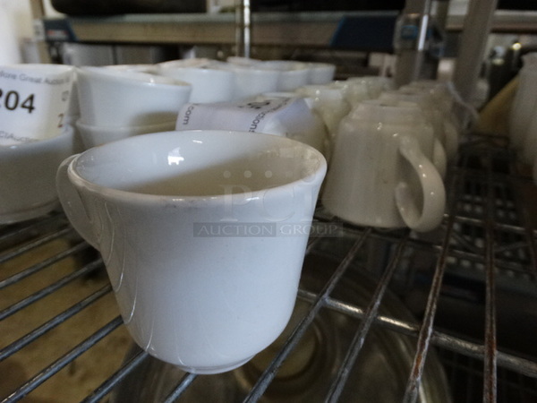 12 White Ceramic Mugs. 3.5x2.75x2.5. 12 Times Your Bid! - Image 2 of 3