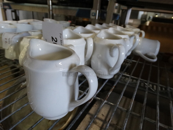 12 White Ceramic Pitchers. 4.5x3x4. 12 Times Your Bid! - Image 2 of 4