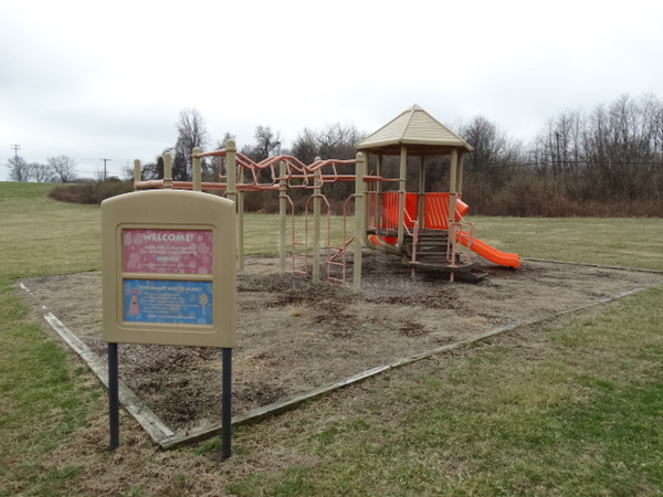 Tan and Orange Metal Playground Unit w/ 2 Slides, Stairs and Monkey Bars. BUYER MUST REMOVE. Item Is Located In Coatesville, PA - Winner Will Have Up To 2 Weeks To Remove. Address Will Be Given To the Winning Bidder After They Provide a Certificate of Insurance - Image 2 of 12
