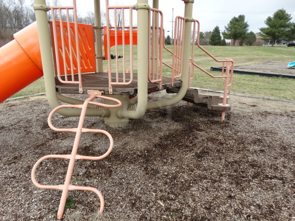 Tan and Orange Metal Playground Unit w/ 2 Slides, Stairs and Monkey Bars. BUYER MUST REMOVE. Item Is Located In Coatesville, PA - Winner Will Have Up To 2 Weeks To Remove. Address Will Be Given To the Winning Bidder After They Provide a Certificate of Insurance - Image 7 of 12