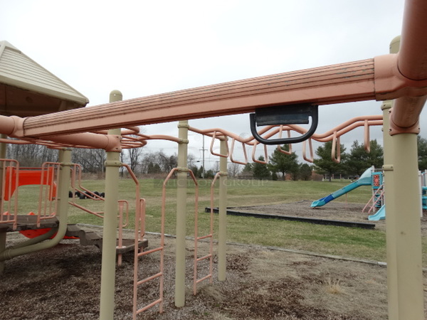 Tan and Orange Metal Playground Unit w/ 2 Slides, Stairs and Monkey Bars. BUYER MUST REMOVE. Item Is Located In Coatesville, PA - Winner Will Have Up To 2 Weeks To Remove. Address Will Be Given To the Winning Bidder After They Provide a Certificate of Insurance - Image 9 of 12