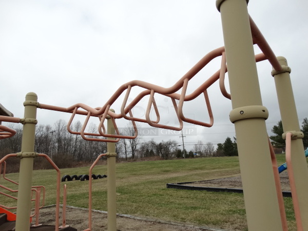Tan and Orange Metal Playground Unit w/ 2 Slides, Stairs and Monkey Bars. BUYER MUST REMOVE. Item Is Located In Coatesville, PA - Winner Will Have Up To 2 Weeks To Remove. Address Will Be Given To the Winning Bidder After They Provide a Certificate of Insurance - Image 10 of 12