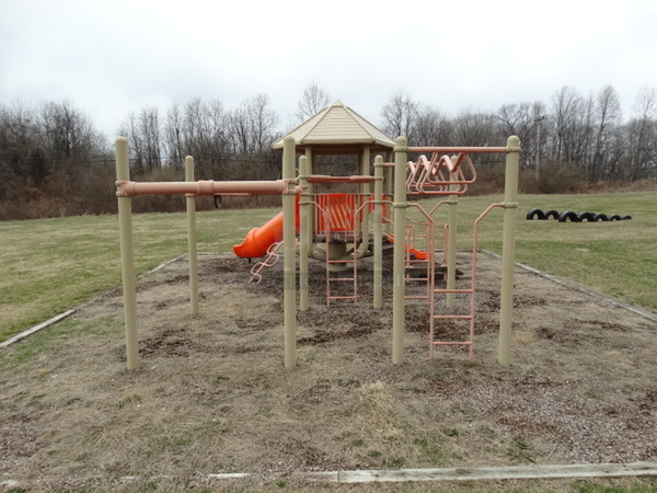Tan and Orange Metal Playground Unit w/ 2 Slides, Stairs and Monkey Bars. BUYER MUST REMOVE. Item Is Located In Coatesville, PA - Winner Will Have Up To 2 Weeks To Remove. Address Will Be Given To the Winning Bidder After They Provide a Certificate of Insurance - Image 11 of 12