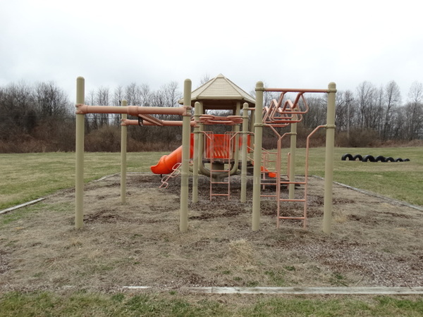 Tan and Orange Metal Playground Unit w/ 2 Slides, Stairs and Monkey Bars. BUYER MUST REMOVE. Item Is Located In Coatesville, PA - Winner Will Have Up To 2 Weeks To Remove. Address Will Be Given To the Winning Bidder After They Provide a Certificate of Insurance - Image 12 of 12