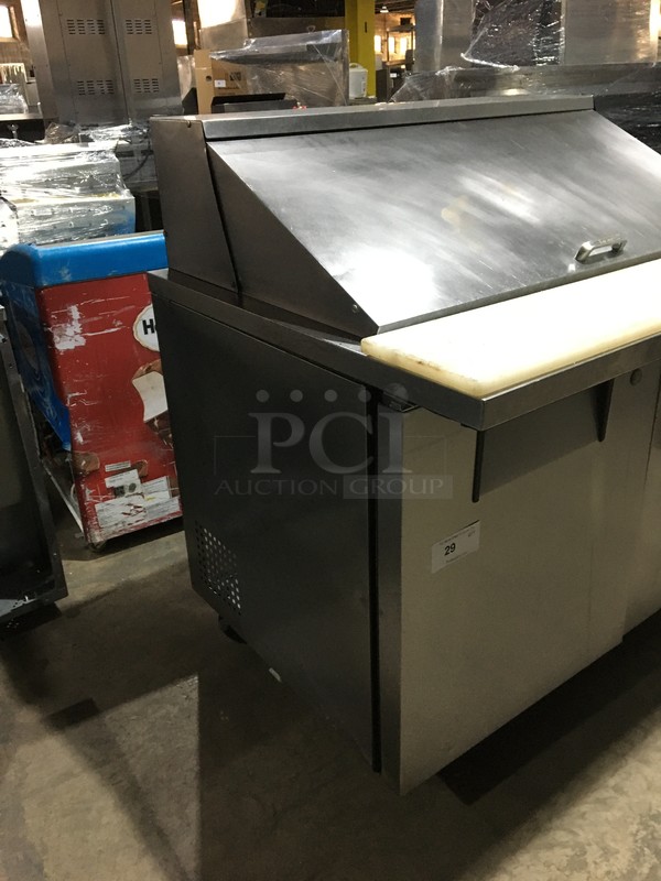 True Commercial Refrigerated Sandwich/Salad Prep Table! With 2 Doors Underneath Storage Space! With Poly Coated Racks! With Commercial Cutting Board! All Stainless Steel! Model TSSU4818MB Serial 7014048! 115V 1Phase! On Commercial Casters!  - Image 2 of 11