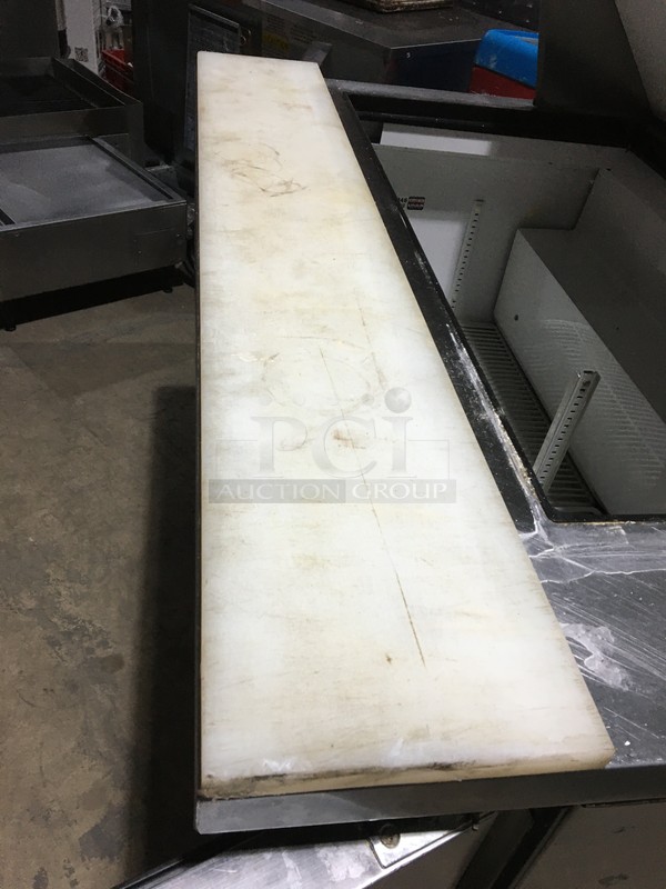 True Commercial Refrigerated Sandwich/Salad Prep Table! With 2 Doors Underneath Storage Space! With Poly Coated Racks! With Commercial Cutting Board! All Stainless Steel! Model TSSU4818MB Serial 7014048! 115V 1Phase! On Commercial Casters!  - Image 8 of 11