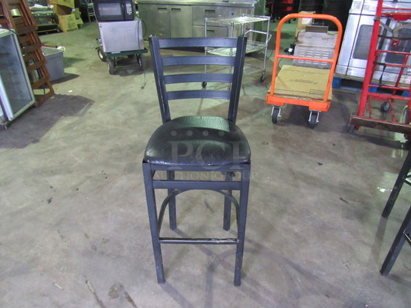 Black Metal Bar Height Chair With A Black Cushioned Seat. Chair Good, Cushion Fair Condition Probably Needs Recovered! 2XBID.