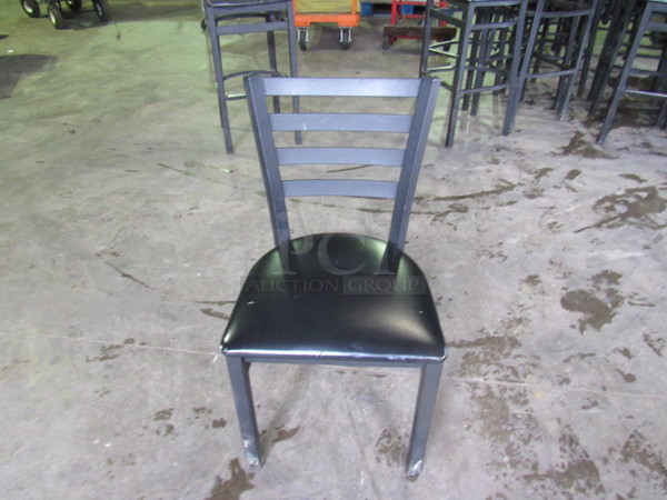 Black Metal Chair With A Black Cushioned Seat. Chair Good, Cushion Fair Condition Probably Needs Recovered! 4XBID.
