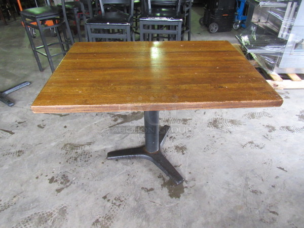 One 1-1/2 Inch Thick Solid Wooden Table Top On A Pedestal Base. 40X30X30