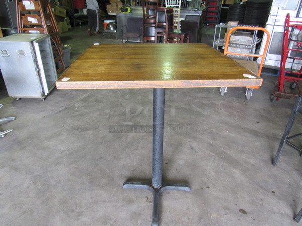 One 1-1/2 Inch Thick Solid Wooden Table Top On A Pedestal Base. 36X36X30
