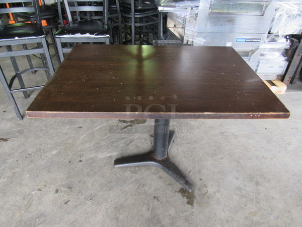 One Solid Wood Table Top On A Bar Height Pedestal Base. 42X30X42.