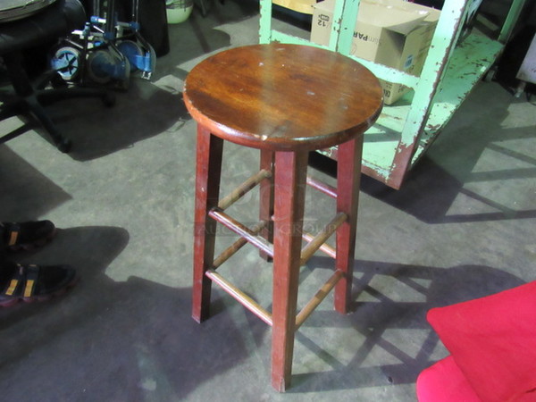 One Wooden Bar Stool.