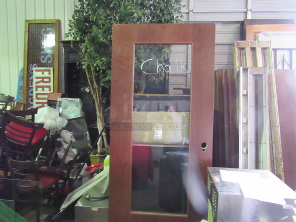 One 36X83.5 Wooden/Glass Door.