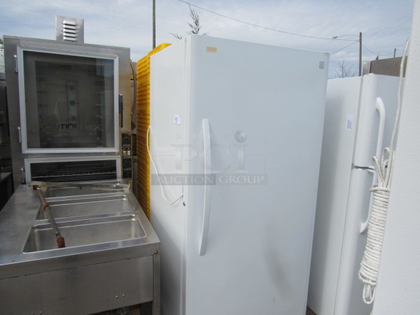 One Kenmore 1 Door Upright Freezer. 115 Volt. WORKING!  Model# 253.21042410.  32X31X70