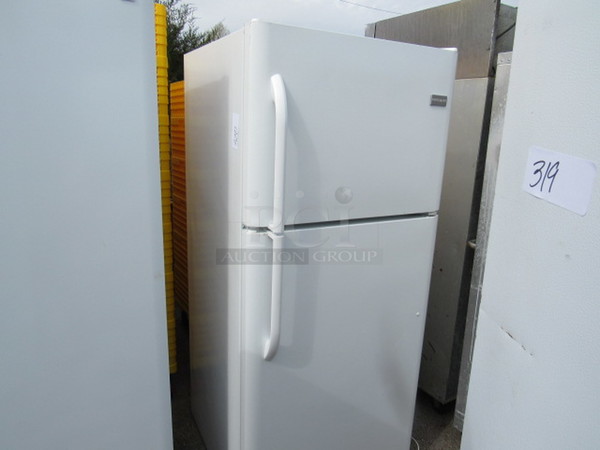 One Frigidaire Refrigerator/Freezer. Model# FFHT2117LW2. WORKING. 115 Volt. 30X35X68