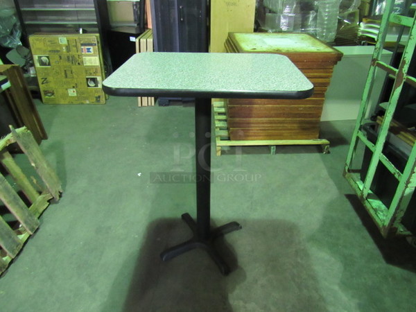 Granite Look Laminate Table Top On A Bar Height pedestal Base. 24X30X42.5